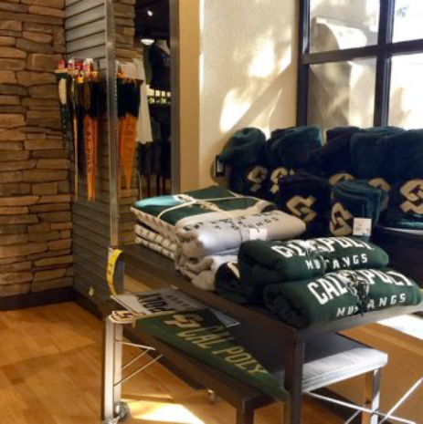 custom apparel merchandising table with folded display layout designed to improve product presentation and customer flow