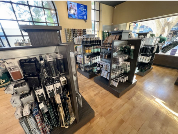 campus retail store merchandising layout with custom fixtures designed to enhance product visibility and customer flow