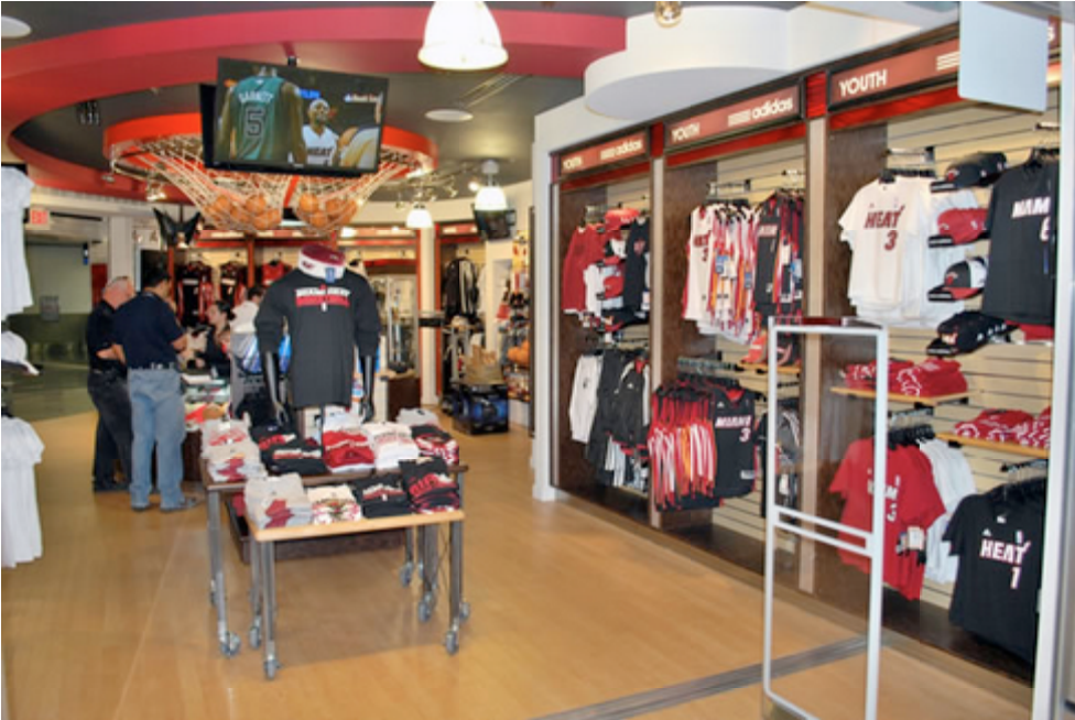 sports retail apparel merchandising layout with branded displays optimized for product visibility and sales conversion